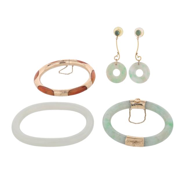group-of-carved-jade-bangles-and-earrings