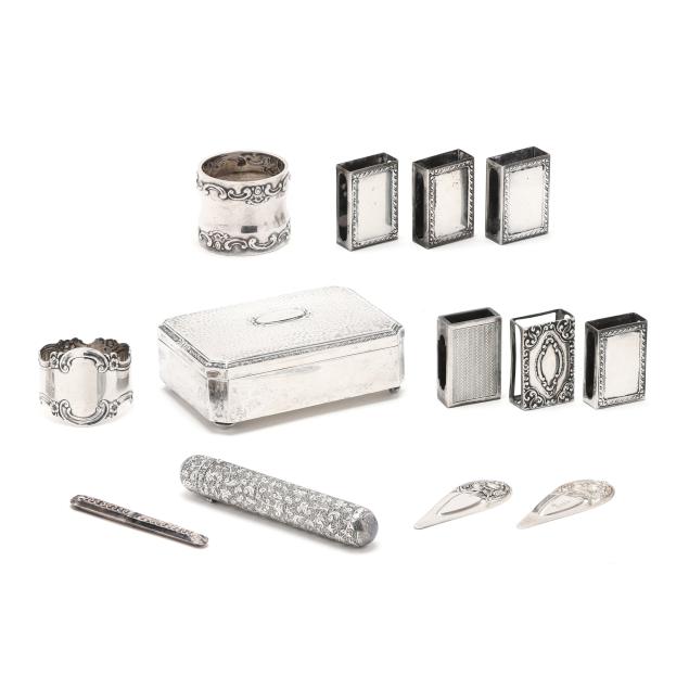 a-collection-of-13-silver-accessories