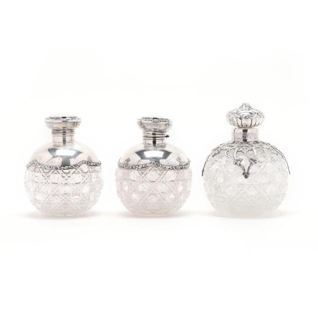 three-english-silver-mounted-crystal-scent-bottles