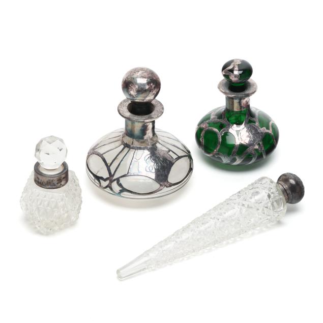 four-silver-mounted-glass-perfume-bottles