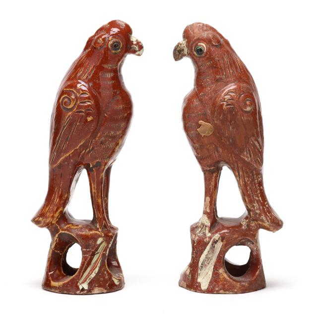 a-pair-of-chinese-iron-red-parrots