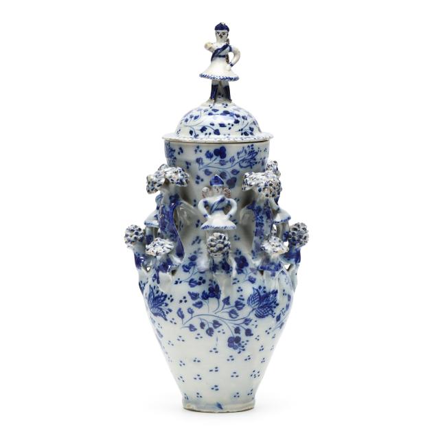 dutch-blue-and-white-ceramic-figural-vase-with-cover