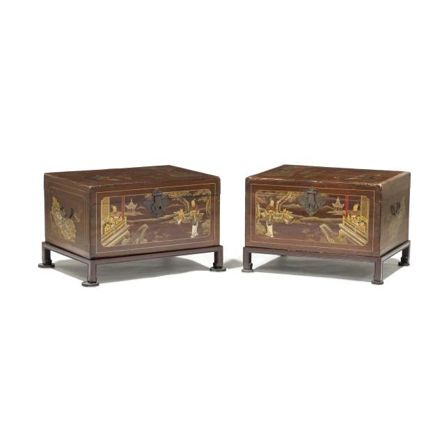 a-pair-of-chinese-lacquered-pigskin-trunks-on-stands