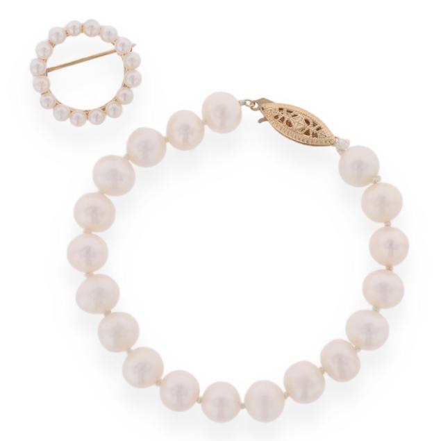 gold-and-pearl-bracelet-and-circle-brooch