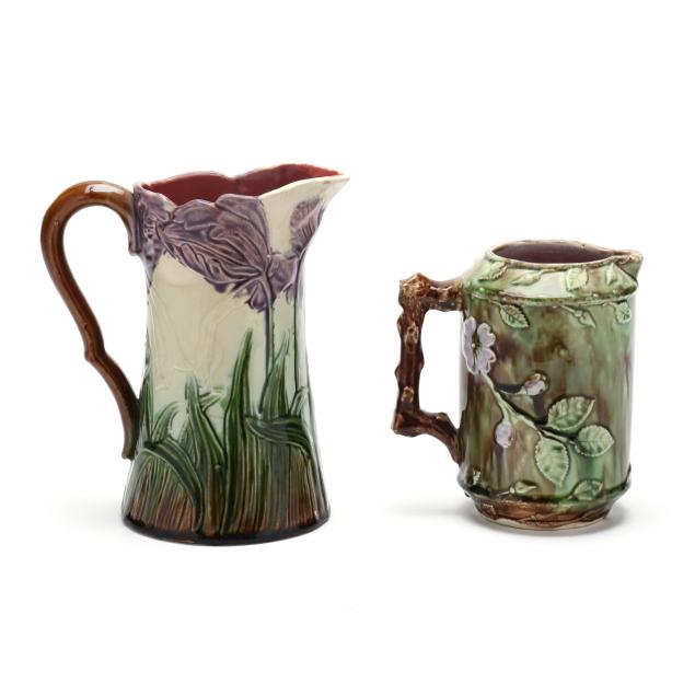 two-antique-floral-majolica-pitchers