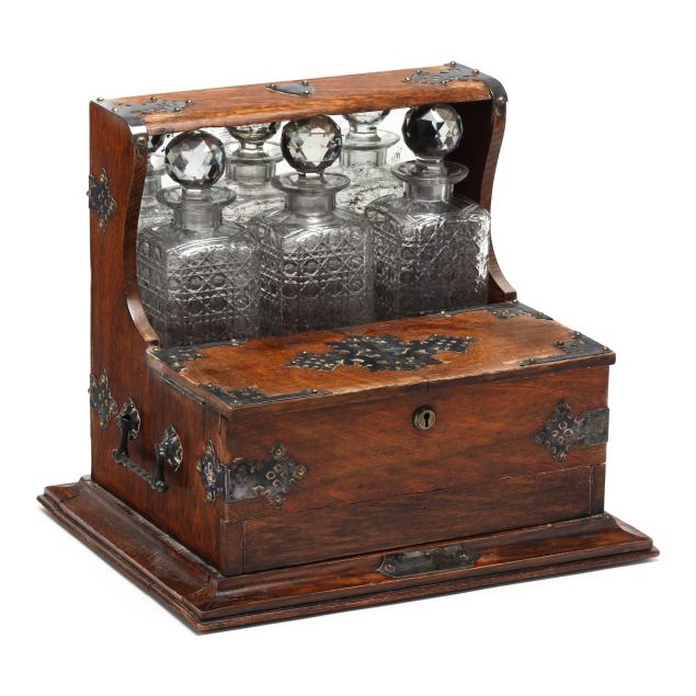 antique-english-tiger-oak-and-silver-plated-tantalus-with-three-cut-crystal-decanters