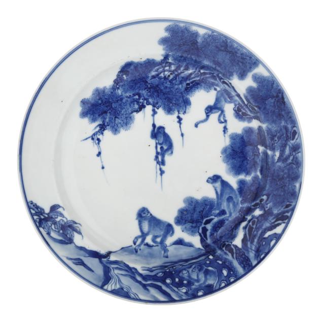 a-very-fine-chinese-blue-and-white-plate-with-monkeys-climbing-a-tree
