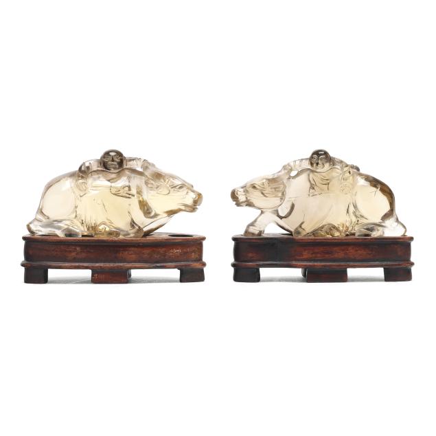 a-pair-of-chinese-carved-rock-crystal-boys-riding-a-water-buffalo