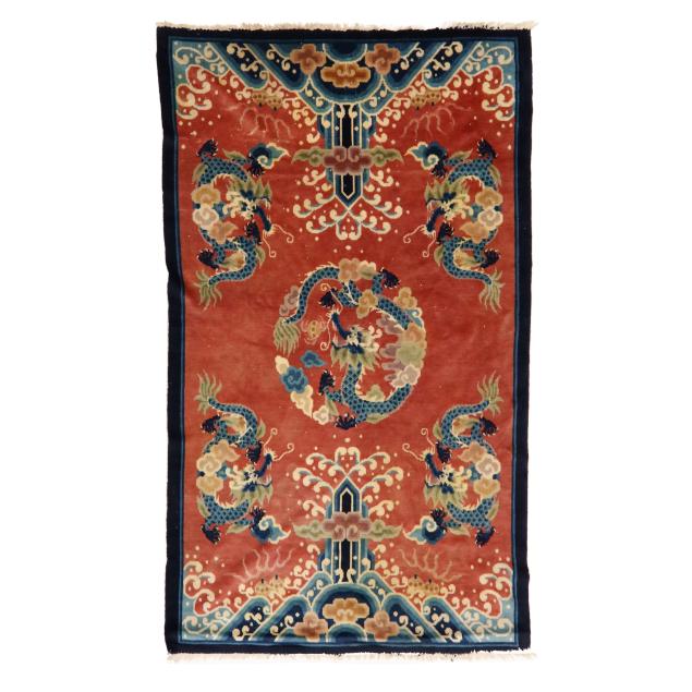 a-chinese-art-deco-salmon-ground-rug-with-dragons