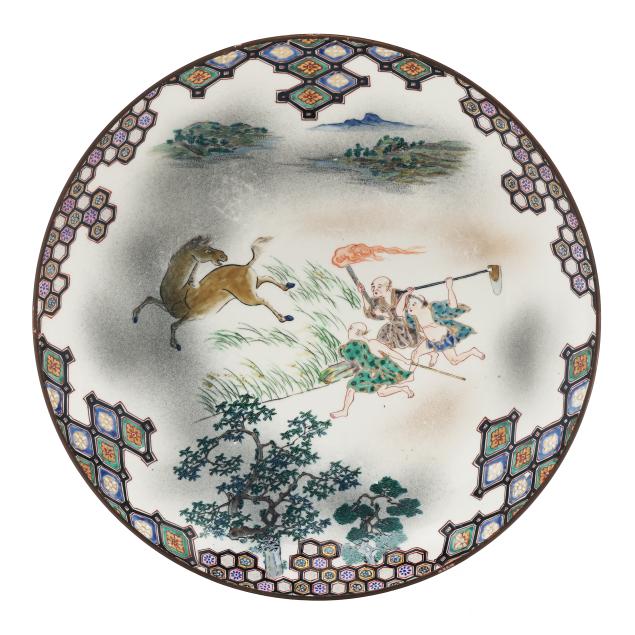 a-japanese-porcelain-charger-with-horse-and-figures