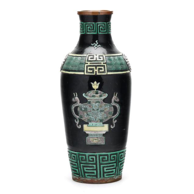a-chinese-black-glazed-stoneware-vase-with-arachic-vessels
