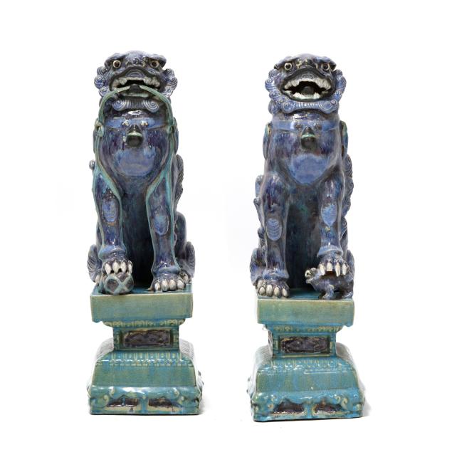 a-pair-of-large-asian-glazed-ceramic-foo-lions