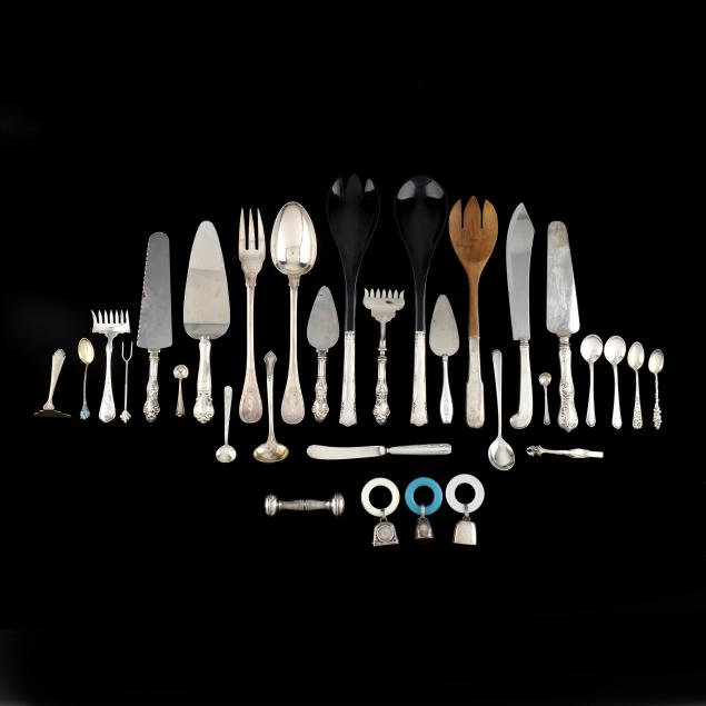 assortment-of-sterling-and-silver-plated-flatware-and-accessories