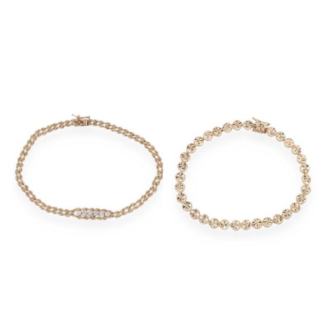 two-gold-bracelets