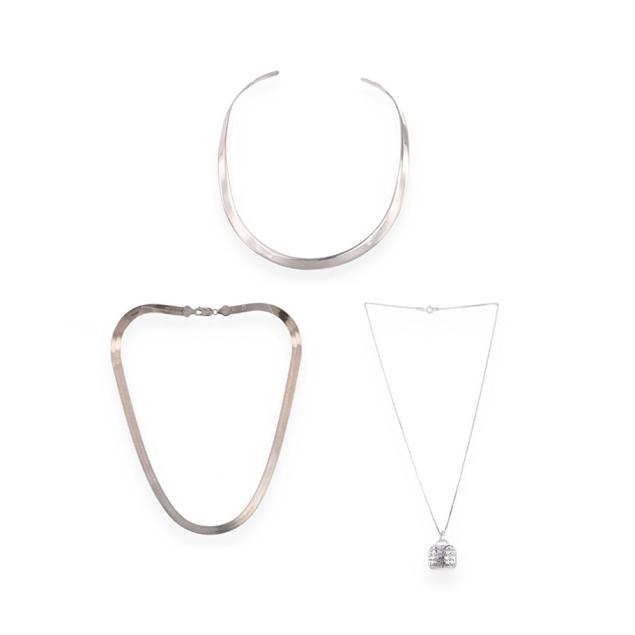 three-silver-jewelry-items