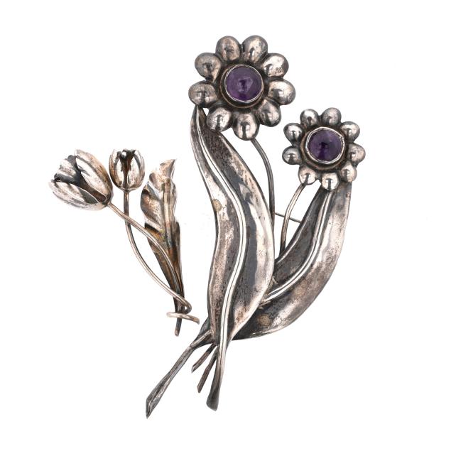 group-of-two-silver-floral-motif-brooches-mexico