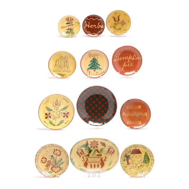 twelve-assorted-pennsylvania-slip-decorated-redware-plates